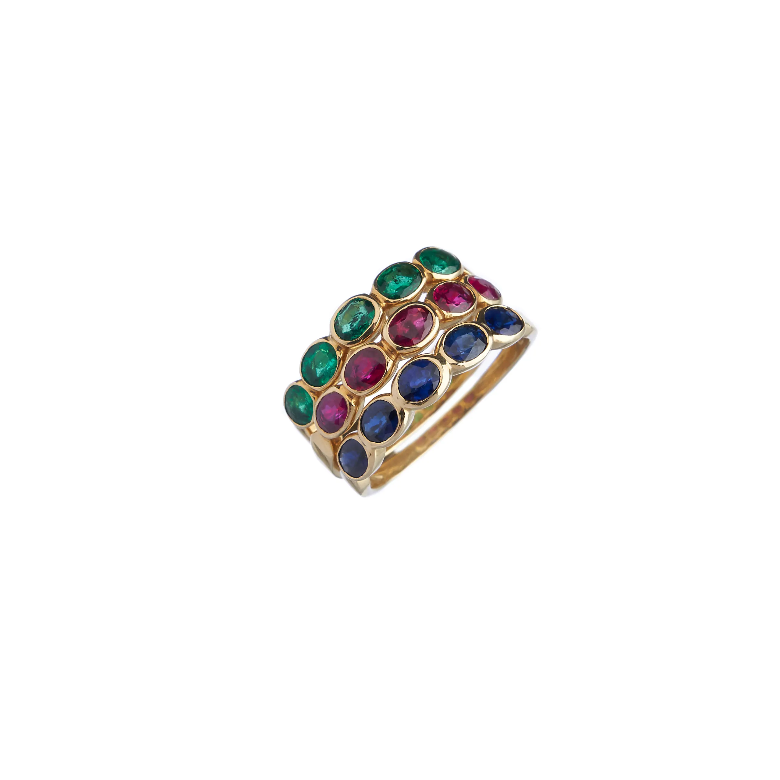 Gold rings with colored stones on a white background
