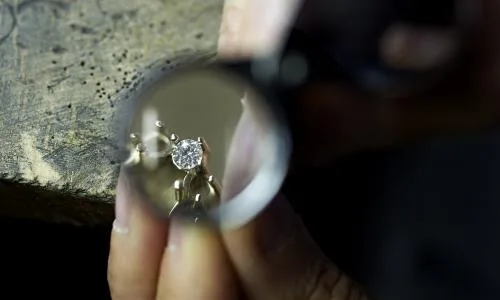 brilliant cut diamond Detail of a ring with a diamond