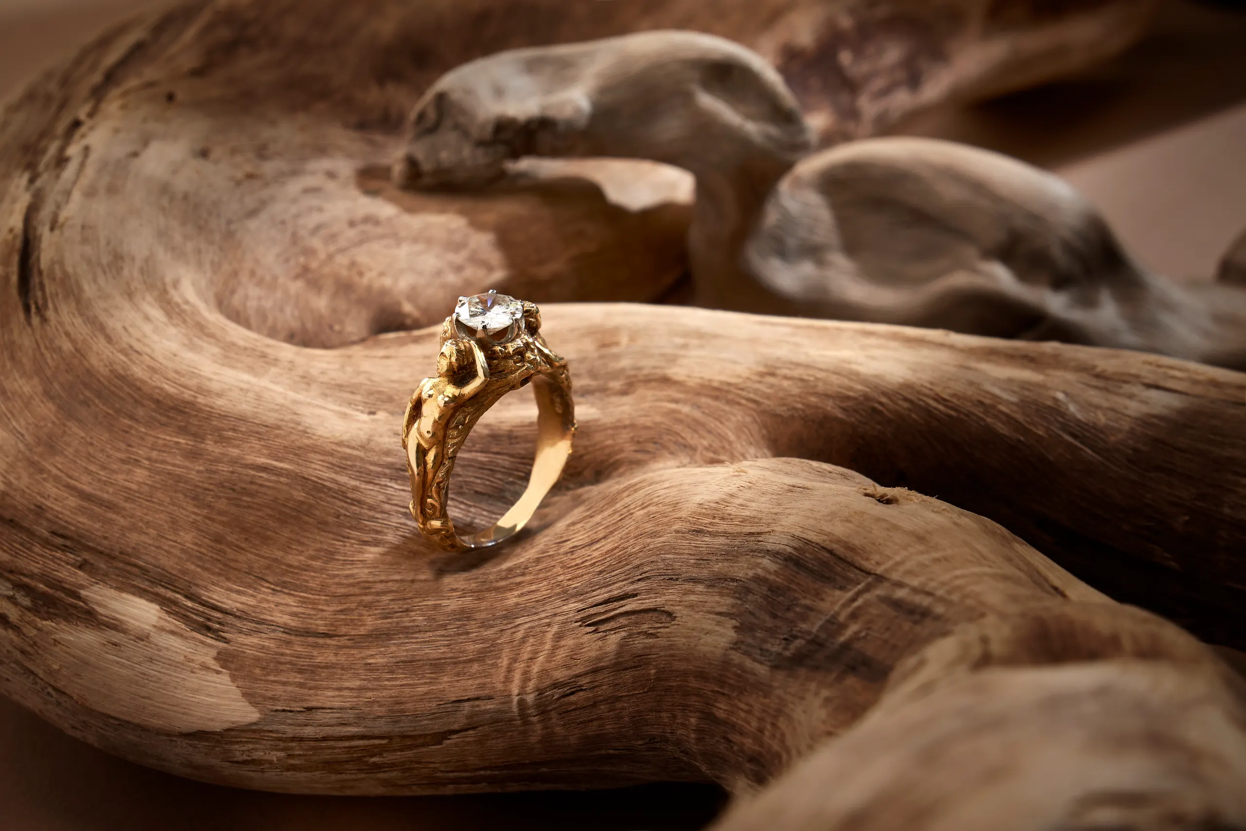 Gold satyr ring with a diamond