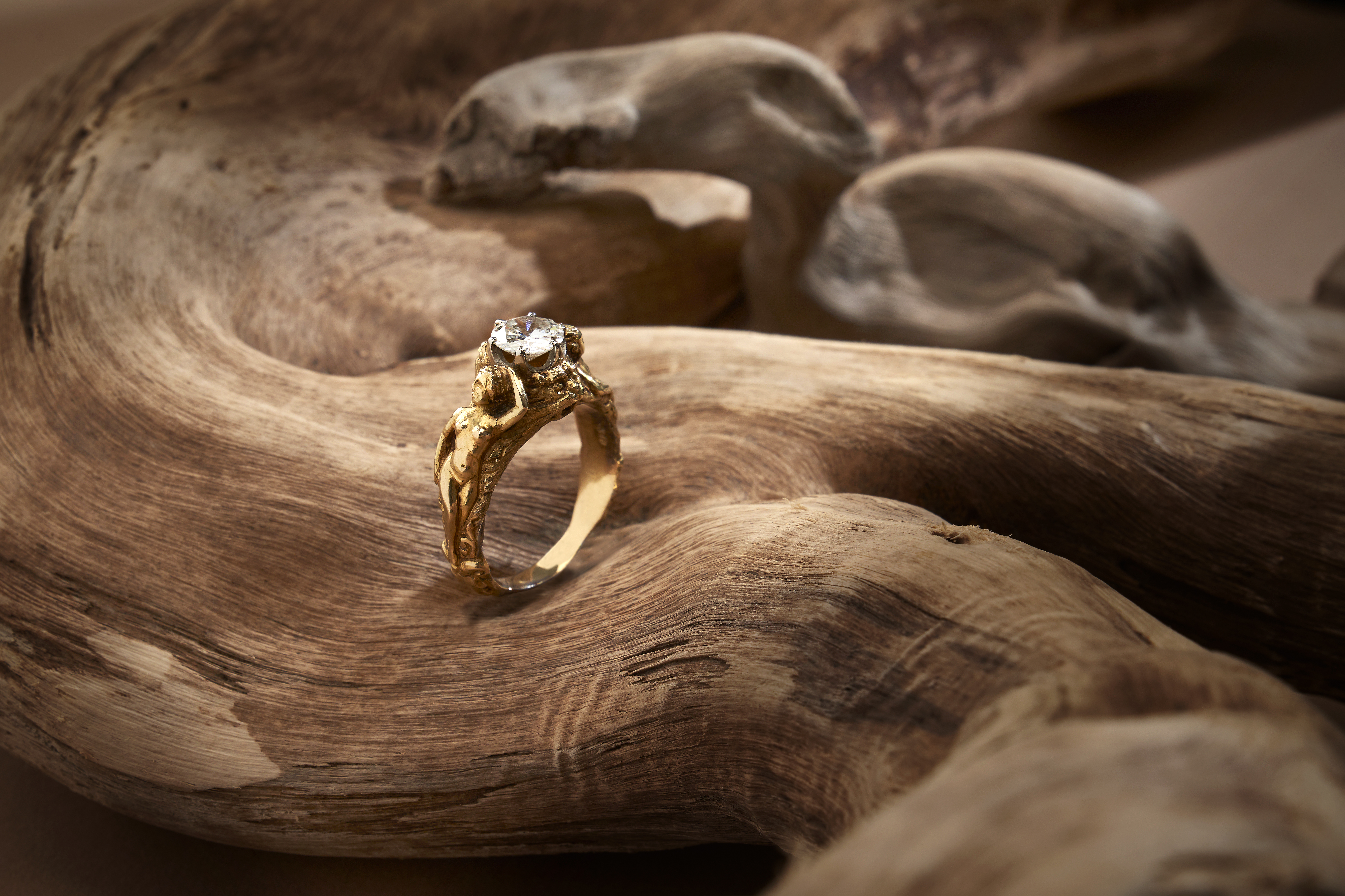 Gold satyr ring with a diamond