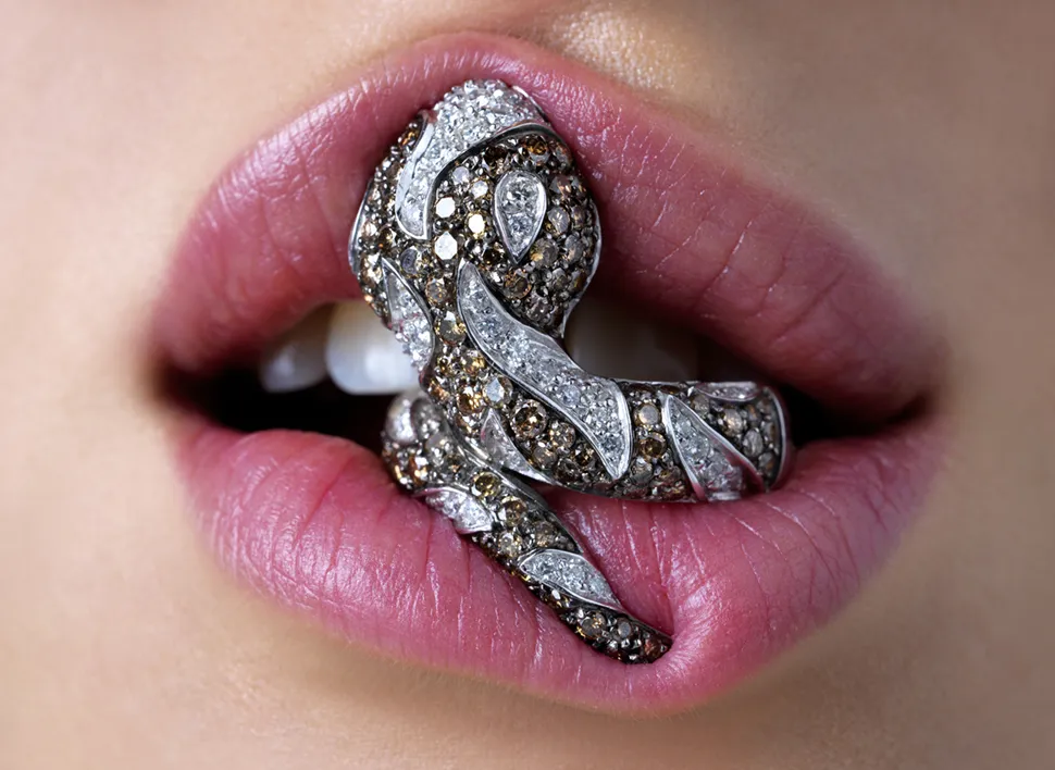 White gold snake ring with diamonds