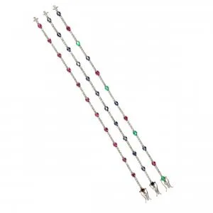 Close up on white background of bracelets with gemstones