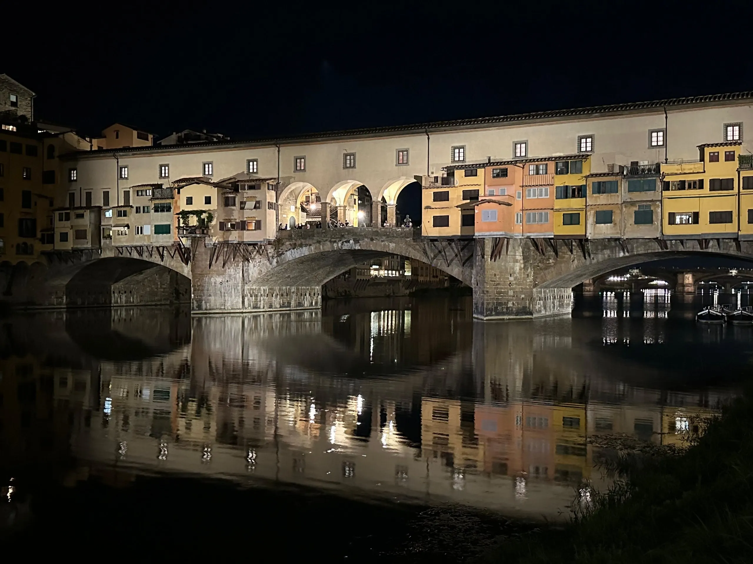 Ponte Vecchio over the Arno at night, home of the Biscioni Gioielli shop