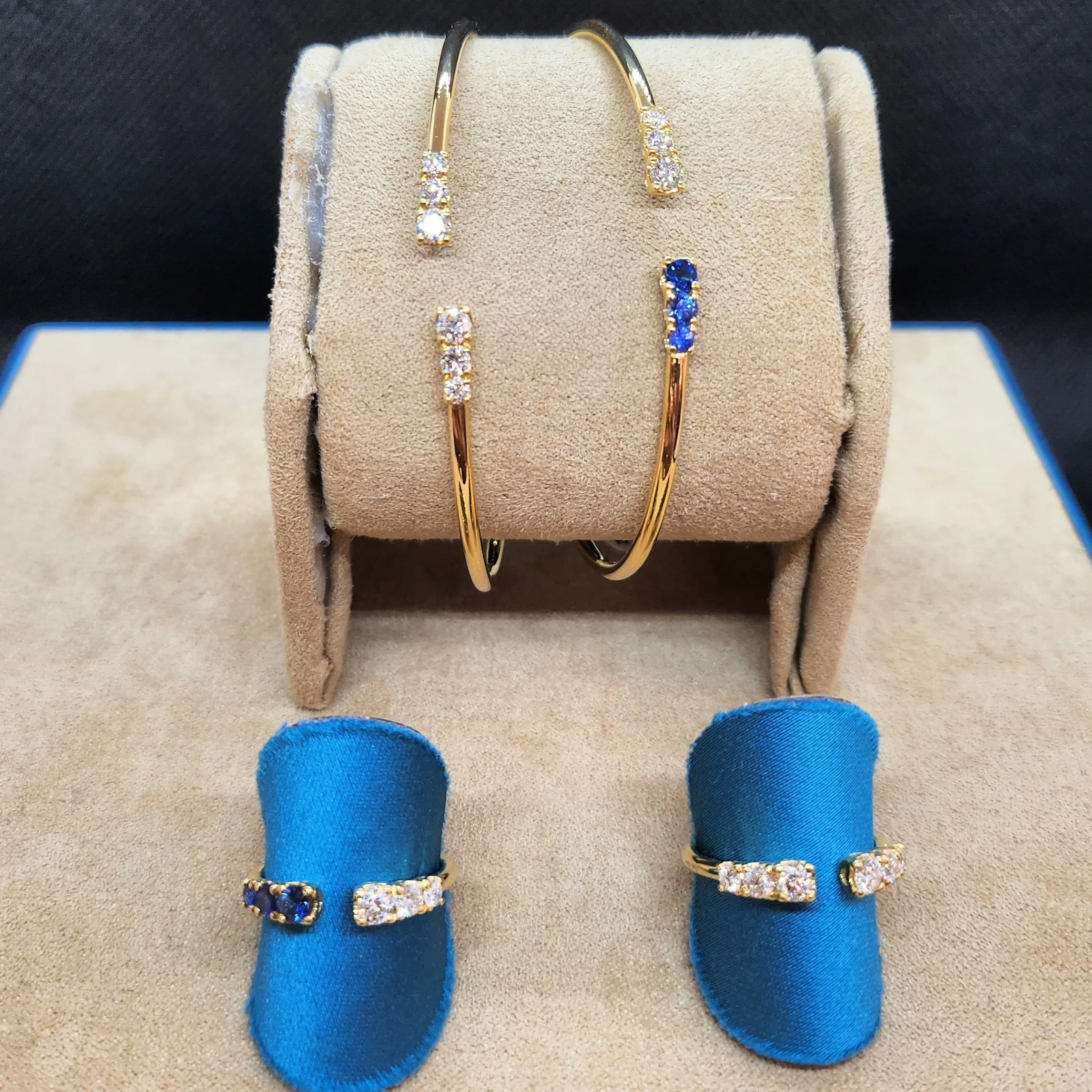 Simple Harmony gold rings and bracelets with diamonds and sapphires